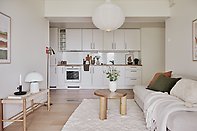 Student dorm room with bed and desk